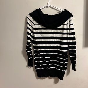 Questions?, size medium. Never worn, black and white stripes.